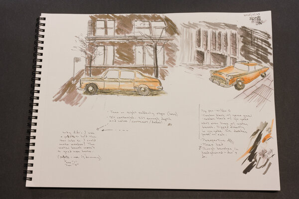 A couple of sketches of a checkered taxi cab from New York. They're poorly drawn, crude. One looks like a kid did it with the wheels all funky.