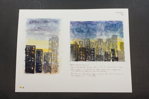 A couple of watercolor sketches of a city skyline using descending opacity and grayscale rectangles for buildings on top of a blue to yellow gradient background. Really messy rectangles. A bit childish looking.