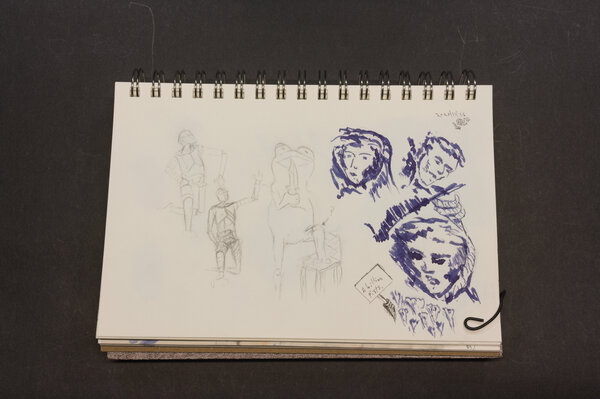 The image that started it all: a rough sketch of a couple of faces with a ruling nib modified Pilot parallel. One head has a noose, some fists in the foreground with a 'Billion Fists' sign held in one hand.